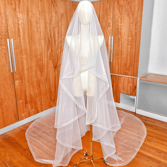 Cathedral length double horsehair wedding veil displayed on a mannequin.