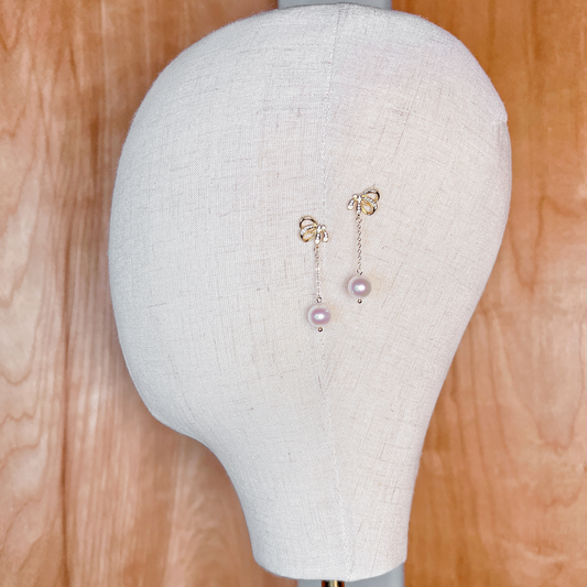 Elegant pearl bowknot dangle earrings for wedding.