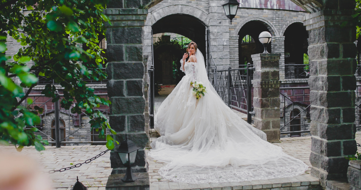 Wedding Dress Has a Long Train? Here's How to Choose the Right Veil Length