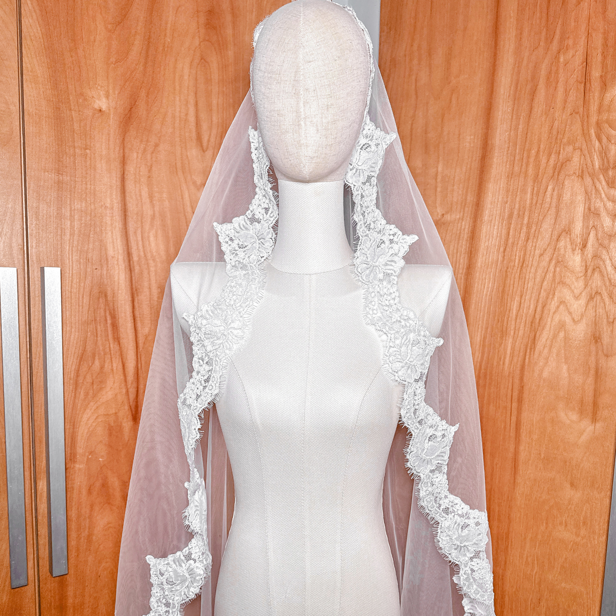Front view of the Alençon lace hem on a traditional Spanish style mantilla veil.
