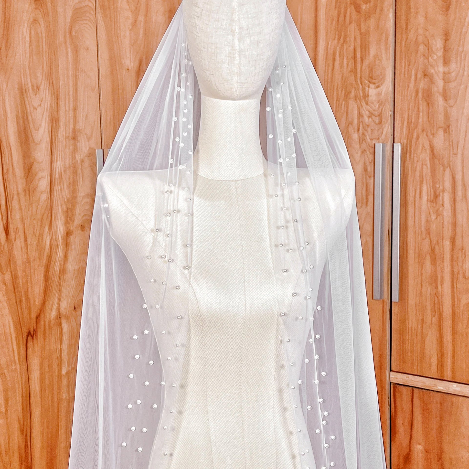 High-angle shot of the Scattered Pearl Edge Wedding Veil.