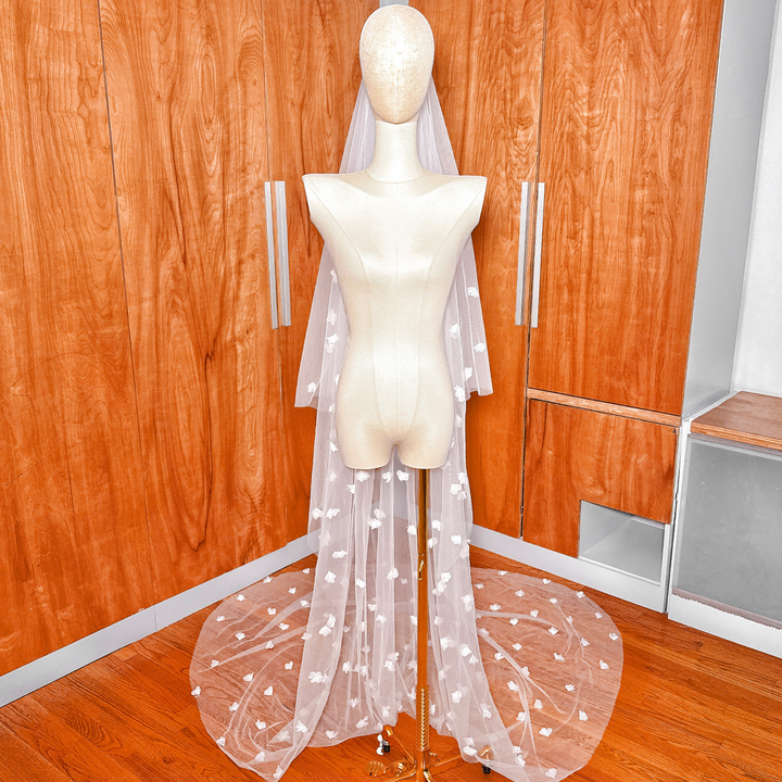 High-resolution view of a bridal two tier 3D floral wedding veil with blusher in cathedral length.
