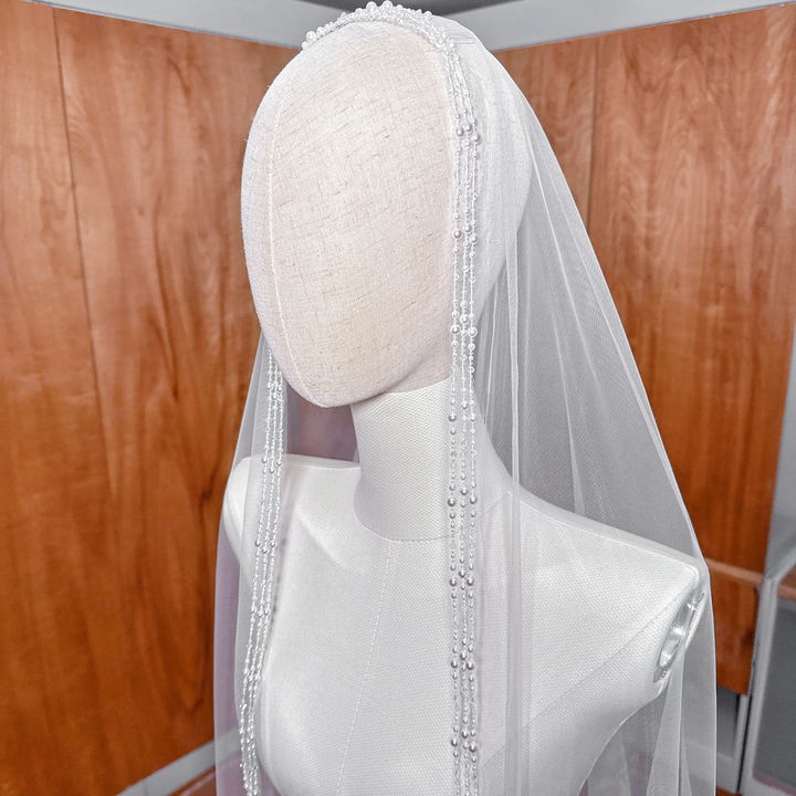 Elegant beaded edge of a cathedral length veil with mixed pearls and clear crystals.
