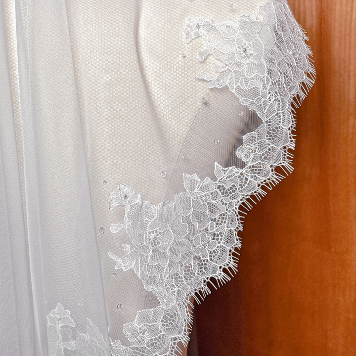 Detail of a Chantilly lace mantilla veil.