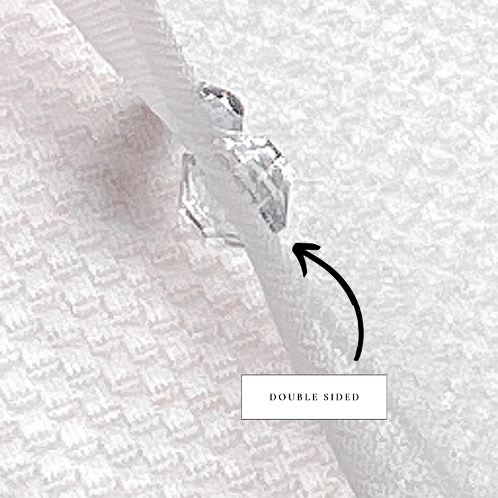 Close-up of rhinestone embellishments on a scattered rhinestone mantilla wedding veil.