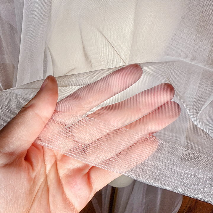 Close-up of the blusher and 1 1/2" horsehair edging on a cathedral length wedding veil.