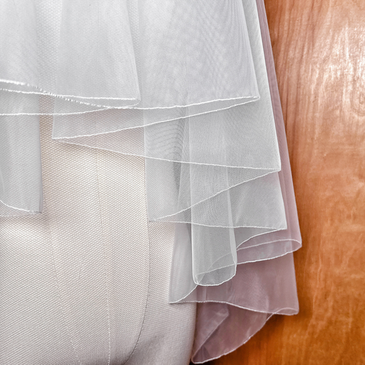 Ivory Pencil Edge Two Tier Fingertip Length Veil.