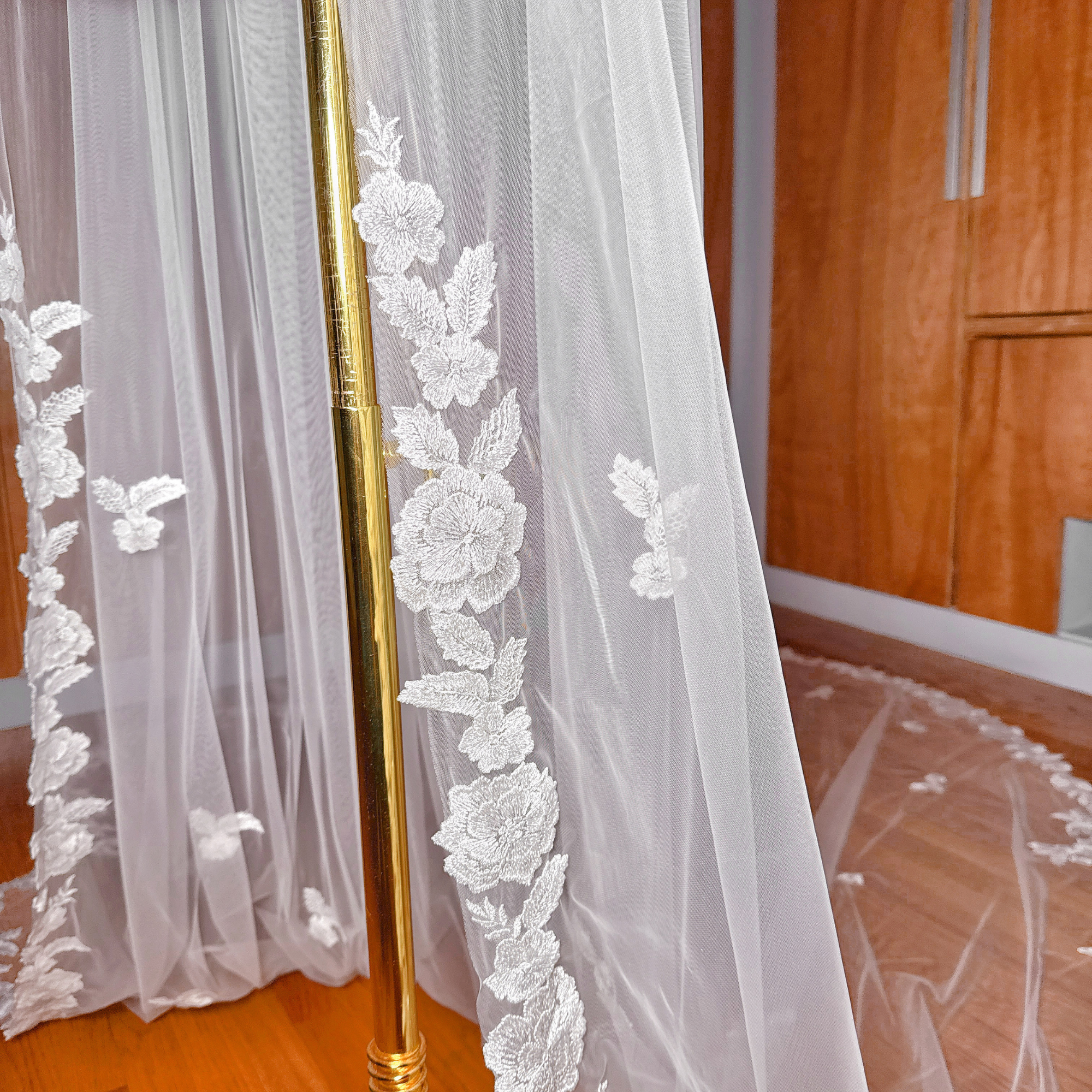 Close-up of the delicate embroidery on a Scalloped Lace Edge Royal Cathedral Veil.