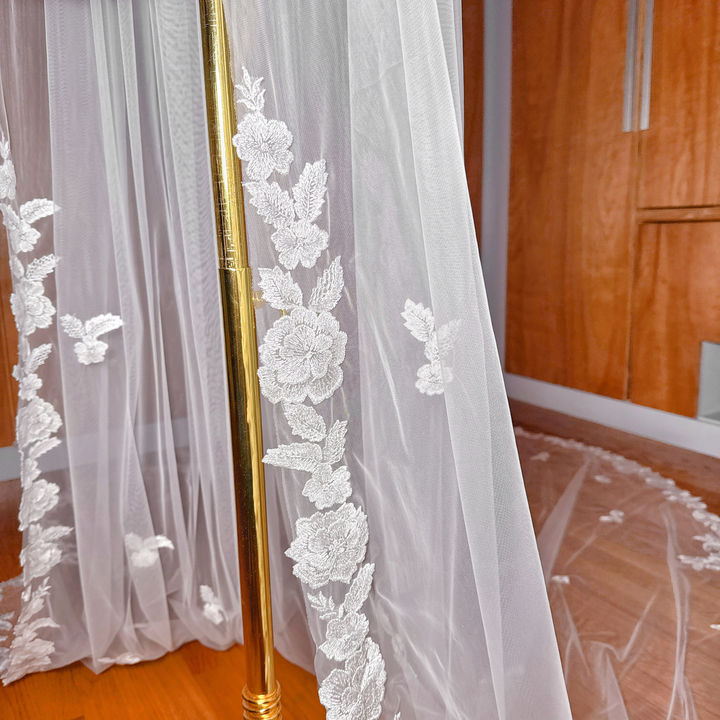 Close-up of the delicate embroidery on a Scalloped Lace Edge Royal Cathedral Veil.