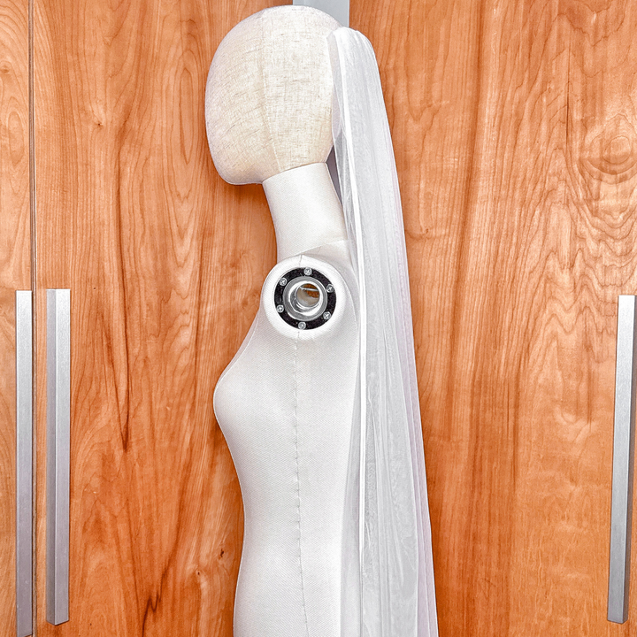 Luxury cathedral length single tier ribbon edge wedding veil showcasing the trim structure.