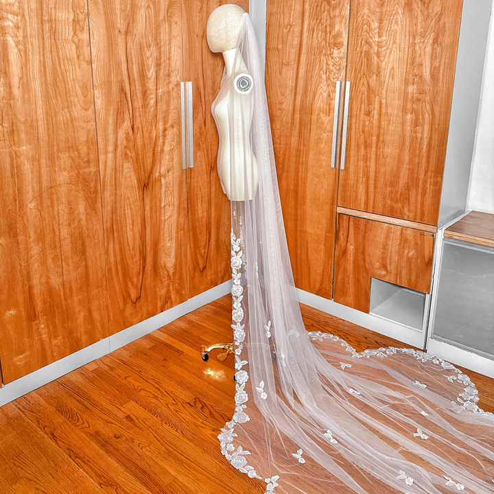 Scalloped Lace Edge Royal Cathedral Veil showing the full floor-length sweep on a mannequin.