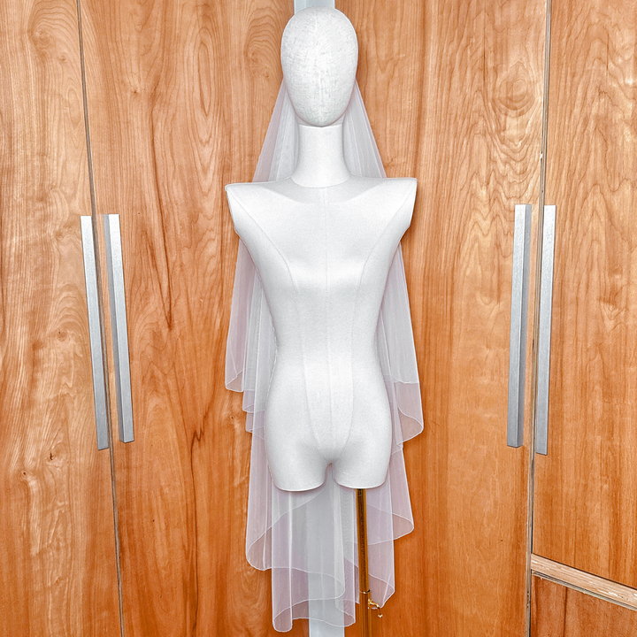 Simple two tier wedding veil with a clean pencil edge finish shown from the back.