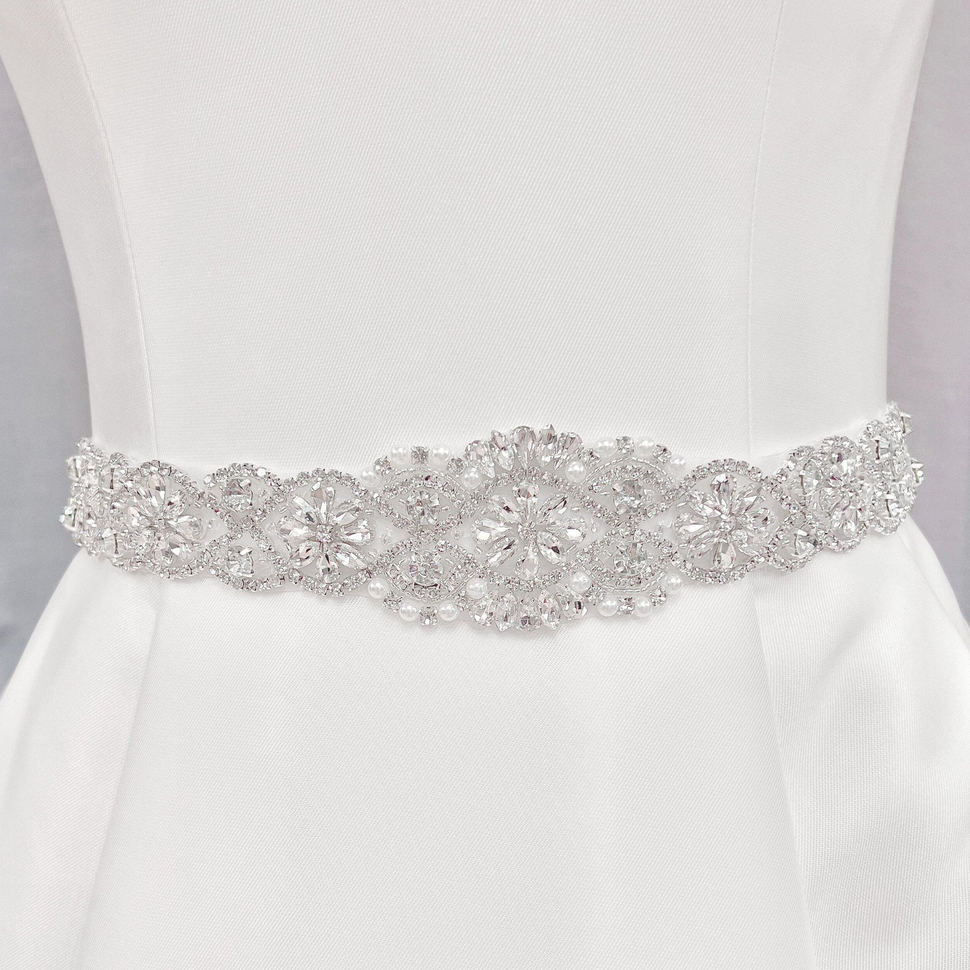 Vintage Pearl Beaded Bridal Belt with intricate crystal accents displayed on a white bridal gown bodice.